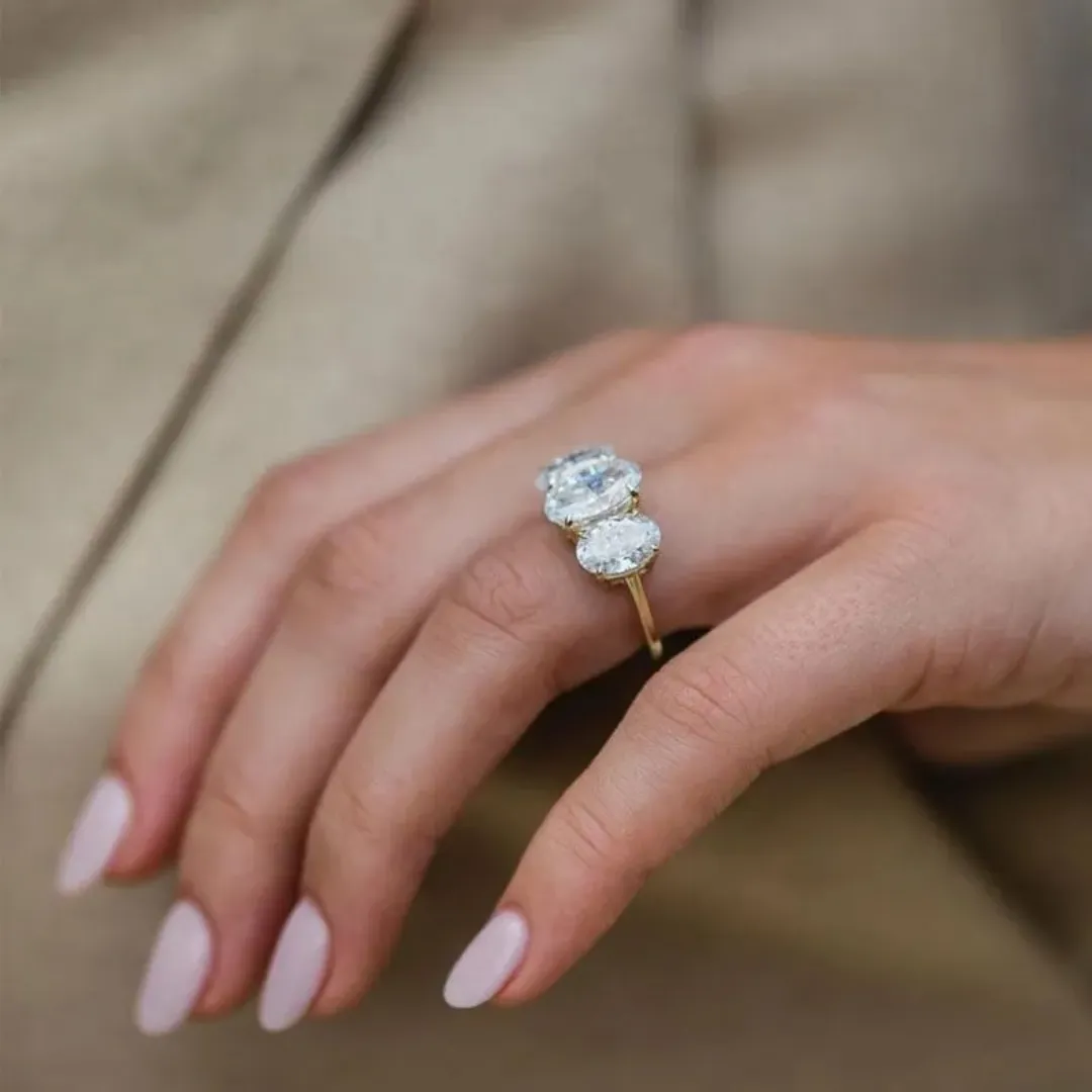 /public/photos/live/Oval Cut Hidden Halo 3 Stone Engagement Ring 478 (4).webp